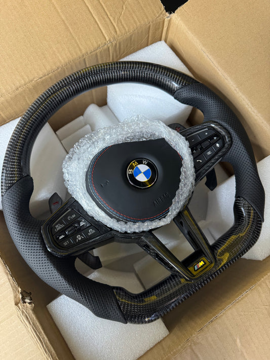Volante BMW Serie E/F/G con inserti in CARBONIO